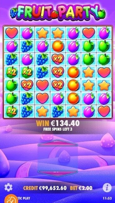 A still from Fruit Party’s free spins mode, showing its grid multipliers and a new purple-colored background.