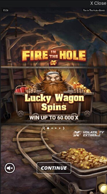 A goldmine and miner dominate the home screen of Fire in the Hole.