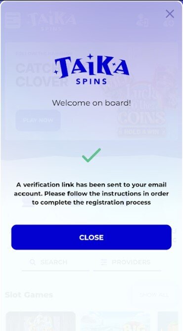 A screenshot showing the prompt to verify your email and confirm your new Taika Spins account