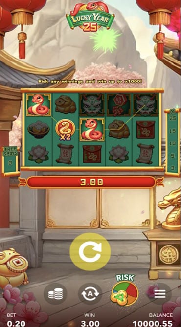 Wild multiplier win during a Lucky Year 25 base game spin