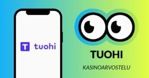 Kuvassa vasemmalla Tuohi Casinon logo älypuhelimen näytöllä, ja vasemmalla Slotsoon isot pyöreät pallosilmät, jotka katsovat älypuhelimen suuntaan. Silmien alla teksti: Tuohi kasinoarvostelu. Kuvan tausta on raikkaan sini-vihreä.